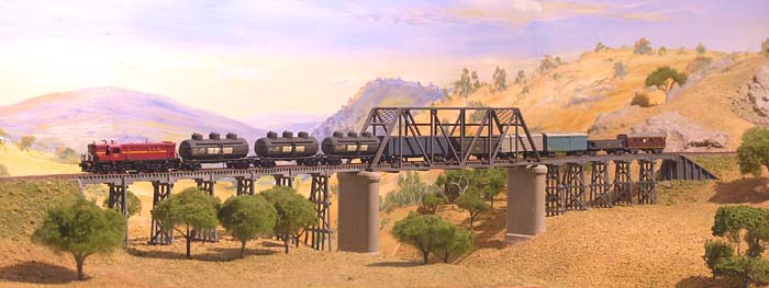 Colour picture: 48 class diesel hauls goods towards the Watsons Flat terminus.